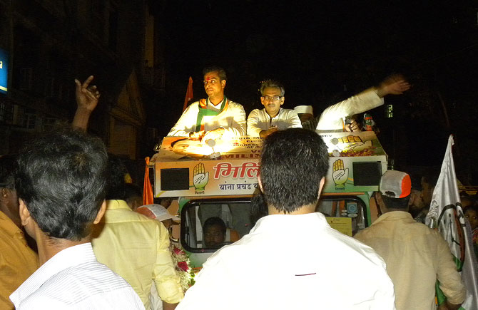 Milind Deora, the Congress candidate for Mumbai South, campaigning at night through Mumbadevi, with local MLA Amin Patel.