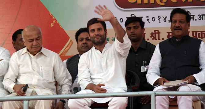Rahul Gandhi with Home Minister Sushilkumar Shinde and Maharashtra CM Prithviraj Chavan at the Mumbai rally on Sunday