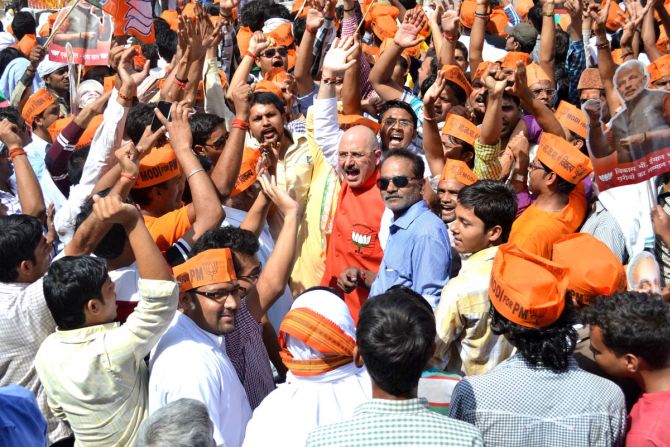 BJP supporters cheer for Modi in Varanasi.
