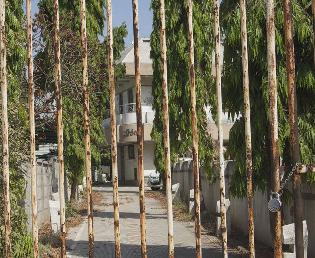 The locked gate of Arihant in Bhavnagar's Krishna Nagar. Ali Asghar Zaveri, who bought this bungalow from Kishoresinh Gohil, was not allowed to undertake renovation of this bungalow.