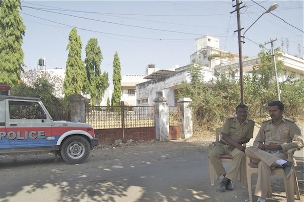 Policemen maintain a vigil outside Arihant. 