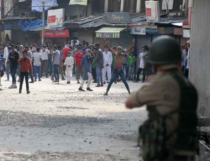 Protestors clash with police in Srinagar on Friday