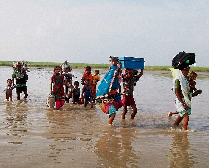 Villagers move to safer place after flood altert in Supaul, Bihar 