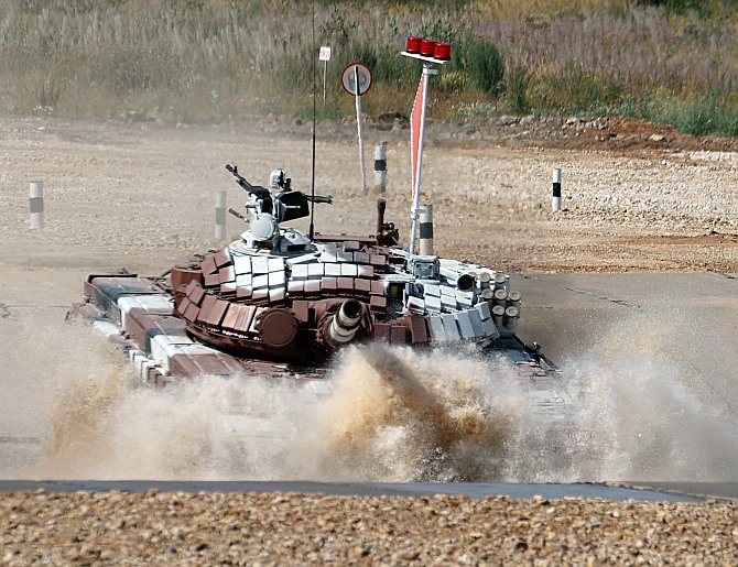 Mongolian tank crew competes at the tank biathlon outside Moscow