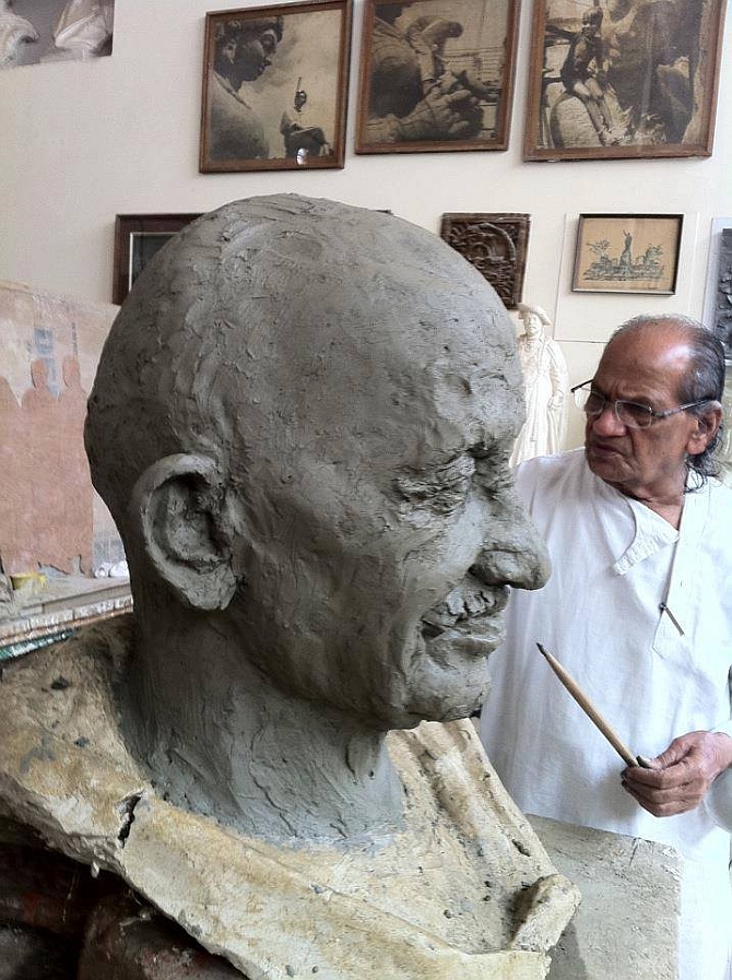 Sutar works on the sculpture of Mahatma Gandhi 