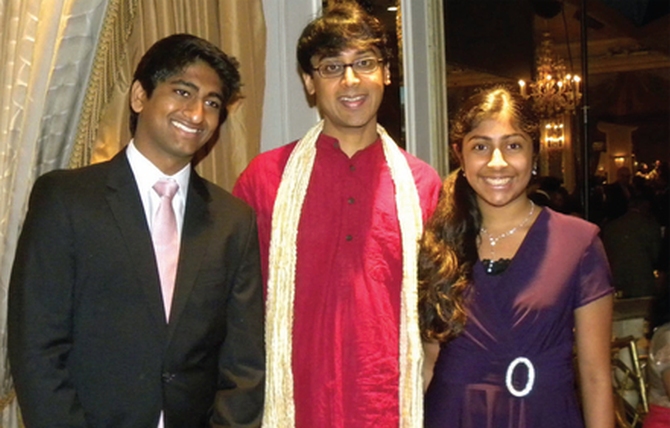 Prof Bhargava with Nithin Tumma (left), winner of the Intel Science Talent Search and Deepika Kurup, winner of America's Top Young Scientist Title