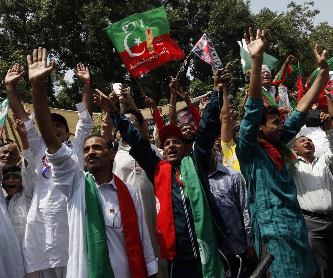 Supporters of cricketer-turned-opposition politician Imran Khan during the Freedom March in Lahore.