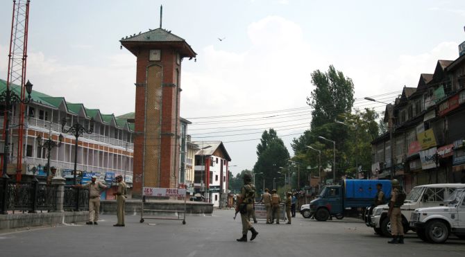 Security personnel stand guard at Lal Chowk