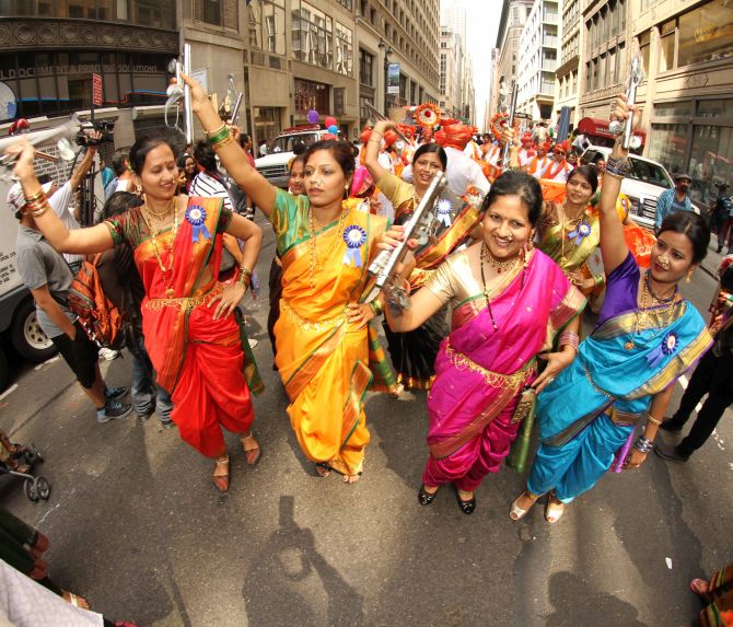 Lavani dancers take centre stage during the parade. The women also danced during the event. 