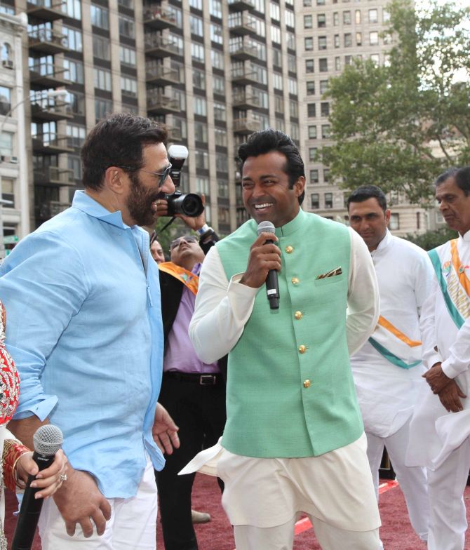 Tennis player Leander Paes shares a laugh with Sunny Deol.