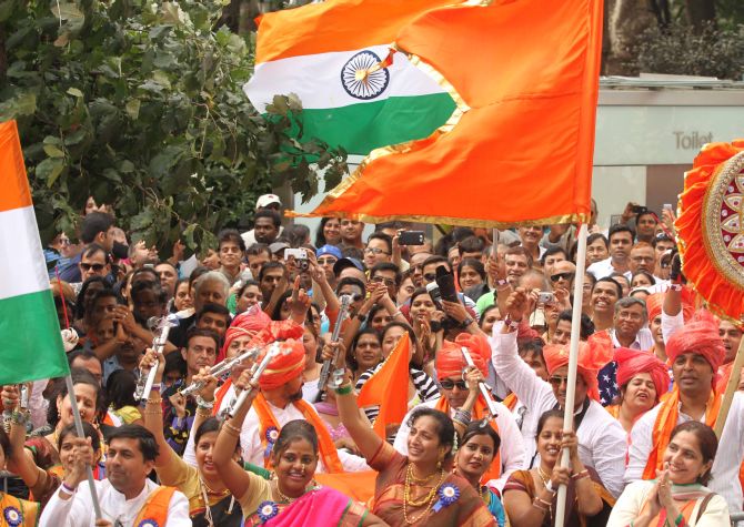 The Indian flag flew high and proud in New York on Sunday and thousands took part in the parade and waved the Indian flag.