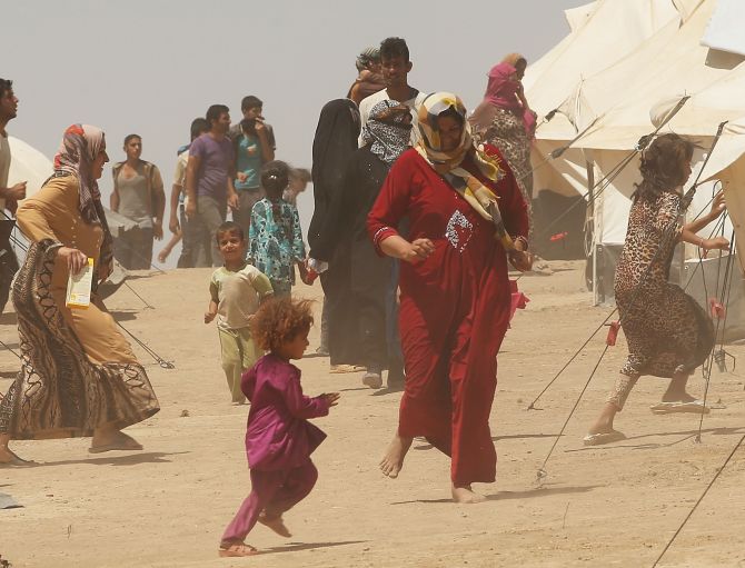 Desperate Iraqis at the Khazair displacement camp for those caught-up in the fighting