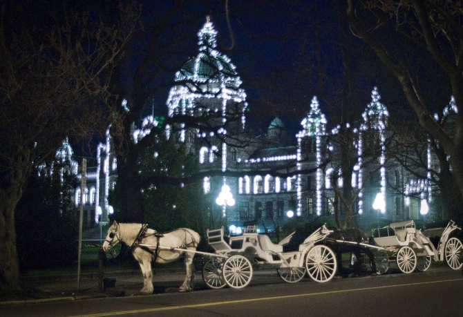 A horse-drawn carriage outside the British Columbia Legislature in Victoria, British Columbia.