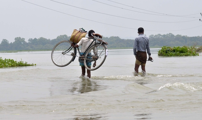 PHOTOS: Flood fury affects lakhs in Assam, UP and Bihar