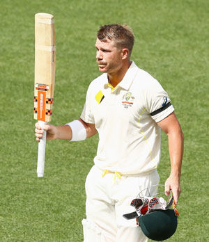 David Warner acknowledges the applause from the crowd after his century on Day 1 of the first Test against India at the Adelaide Oval on Tuesday.