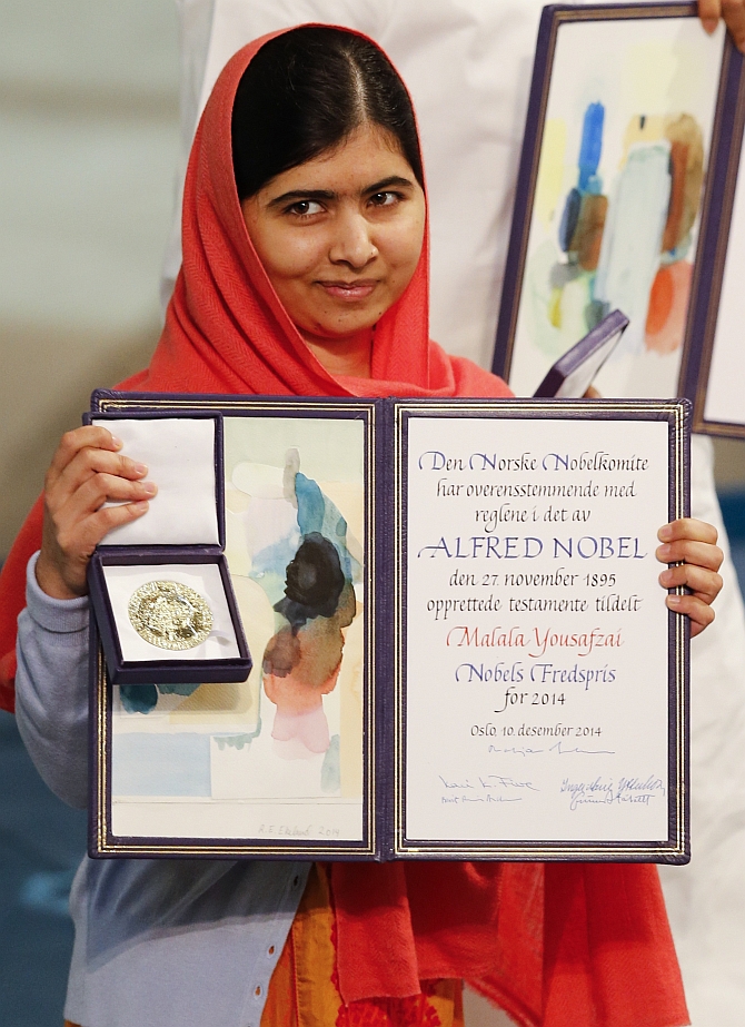 Nobel Peace Prize Laureate Malala Yousafzai with the medal and diploma during the Nobel Peace Prize ceremony in Oslo. Photograph: Suzanne Plunkett/Reuters