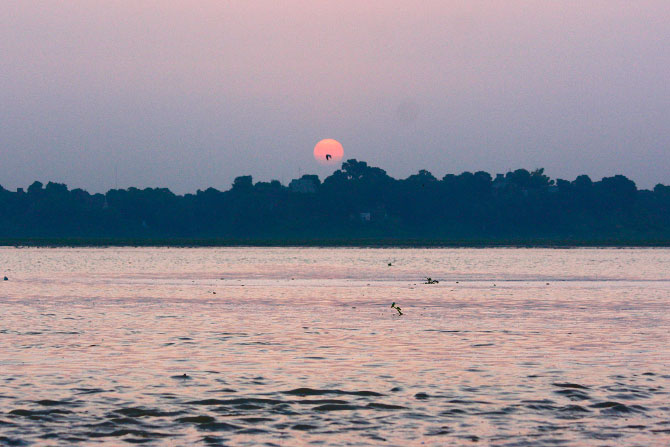 The setting sun at the Sangam