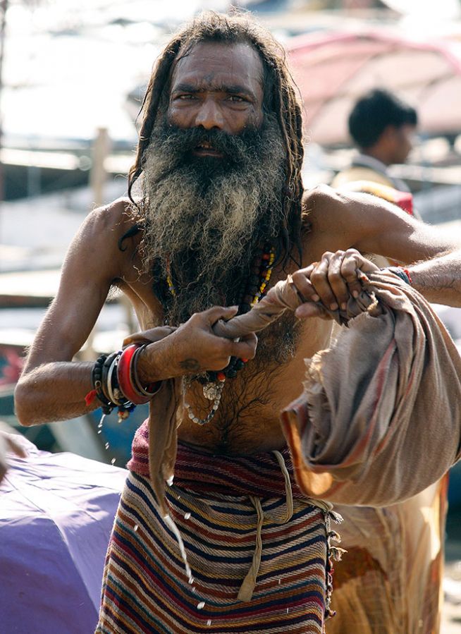 Sadhus come for a dip in the Sangam