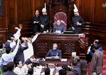 Members of the Rajya Sabha demand that the prime minister make a statement and assure the House that religious conversions won't take place. Photograph: PTI photo