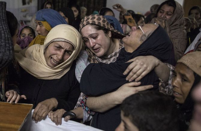 Women mourn Mohammed Ali Khan, 15, a student who was killed during the attack by Taliban murderers on the Army Public School in Peshawar, December 16, 2014. Photograph: Zohra Bensemra