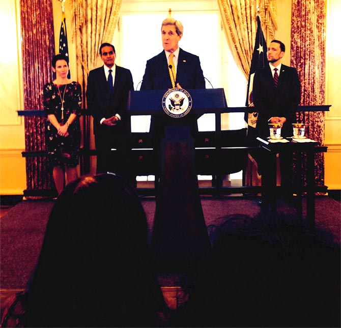 US Secretary of State John F Kerry at the swearing-in. Ambassador Richard Verma and his wife Pinky can be seen on the left, back row.