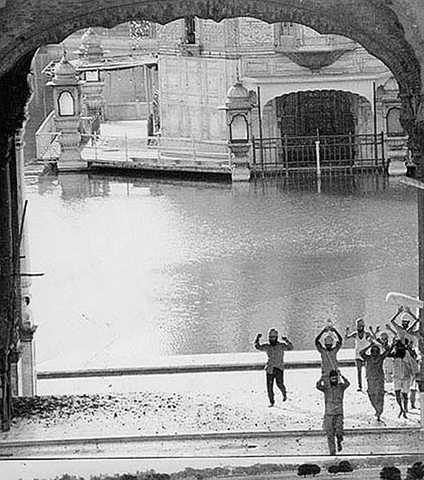 Individuals at the Golden Temple after Operation Blue Star -- the military operation ordered by then prime minister Indira Gandhi to evict Sikh separatists who were amassing weapons in the shrine in June 1984.