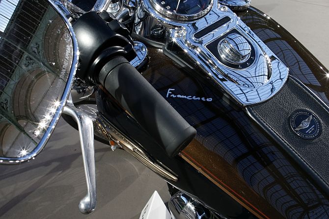 Pope Francis signature is seen on the tank of his 1,585 cc Harley Davidson Dyna Super Glide
