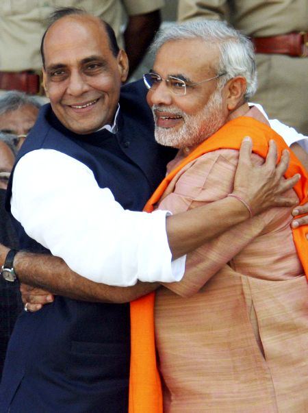 BJP's PM candidate Narendra Modi and BJP president Rajnath Singh. The survey has predicted that the party alone would secure 202 seats