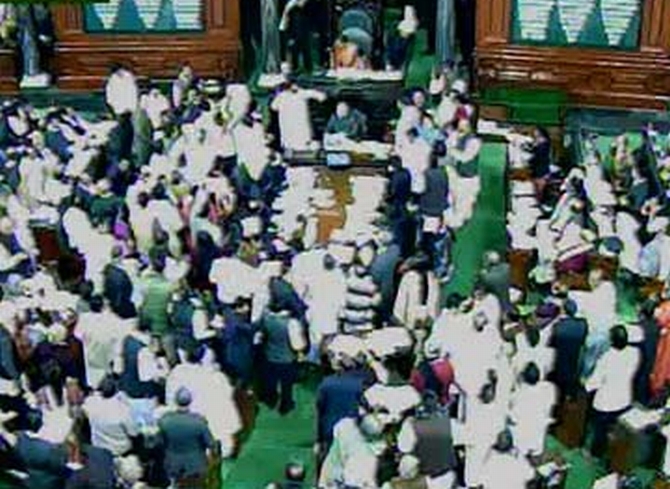 The ruckus in Lok Sabha over the Telangana Bill