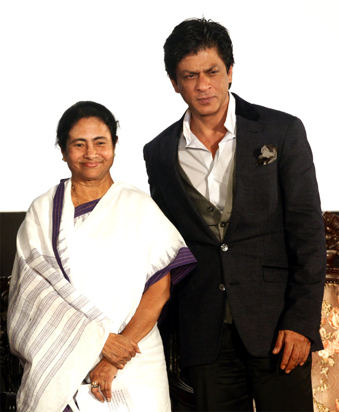 West Bengal Chief Minister Mamata Banerjee with actor Shah Rukh Khan at an event