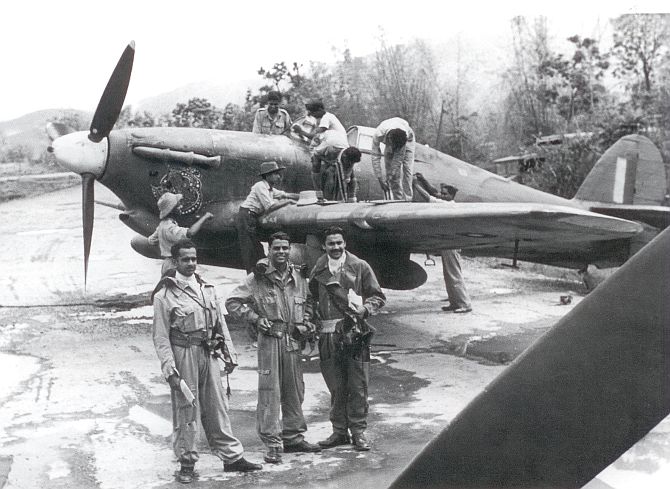 Flight Commander Squadron Leader Rajaram with pilots, technicians and a Hurricane during the Burma campaign in World War II