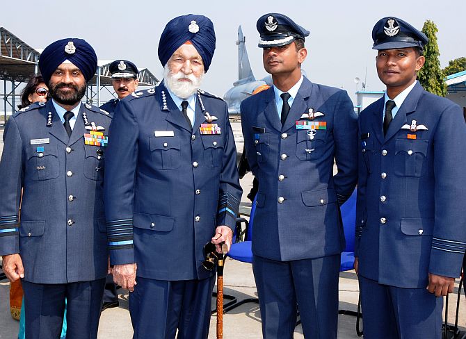 The legendary Marshal of the Air Force Arjan Singh, second from left, with Air Marshal Daljit Singh, left, and Wing Commander Pannu and Squadron Leader Kareem (right) at the Tigers's den at the Air Force Station in Gwalior.