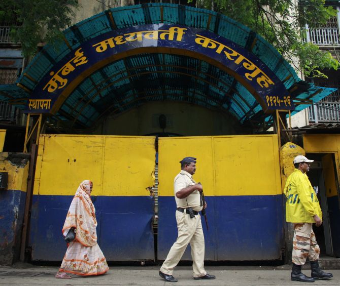 Policemen stand outside the Arthur Road prison in Mumbai