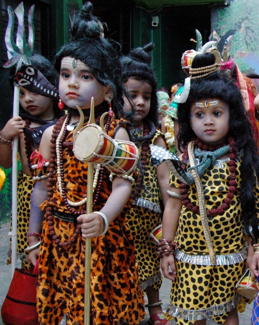 Children dressed as Lord Shiva take part in a religious procession on the eve of Mahashivaratri in Bhopal.