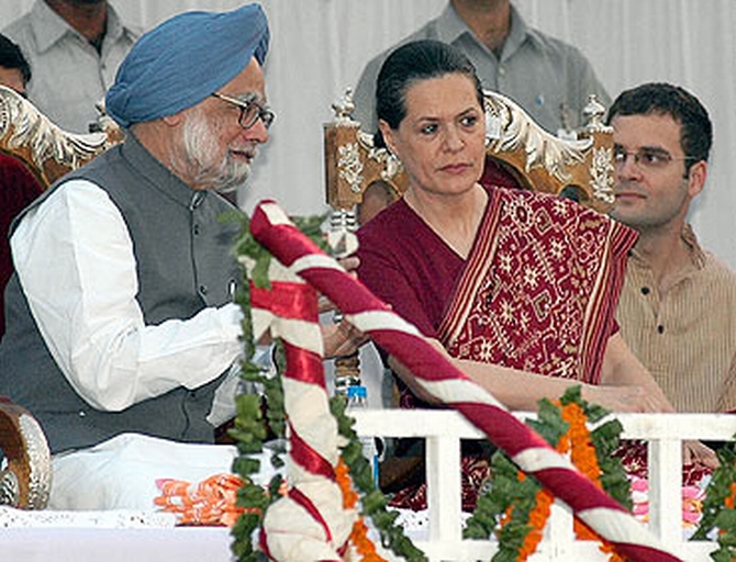 Prime Minister Manmohan Singh with Congress President Sonia Gandhi and party vice president Rahul Gandhi