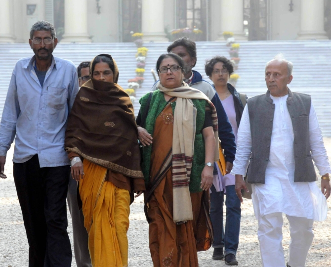Ramshankar Jha and Anita Jha, parents of the victim, along with CITU leaders outside Raj Bhavan