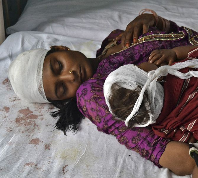 A woman and her child, who were injured in the communal clashes, in a Muzaffarnagar hospital.