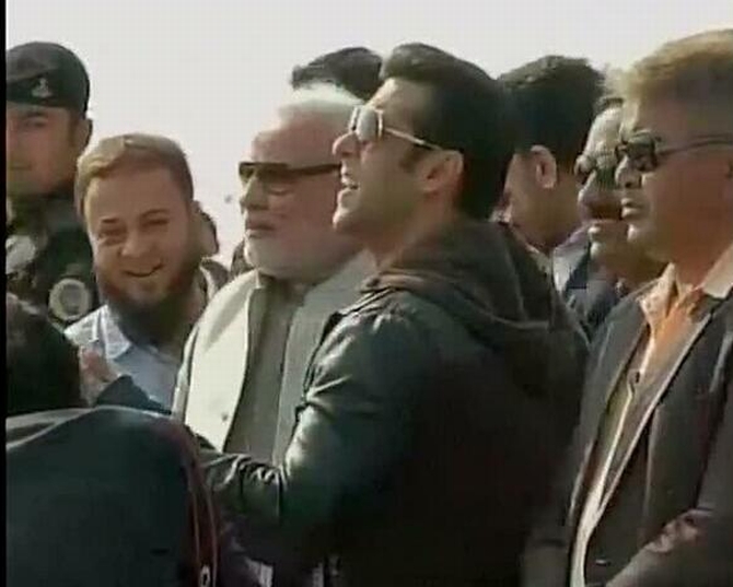 Salman Khan flying kites alongside Narendra Modi in Ahmedabad on Tuesday. Zafar Sareshwala is also seen.
