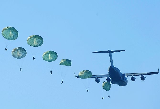 India Army paratroopers parachute from a C-17 Globemaster.