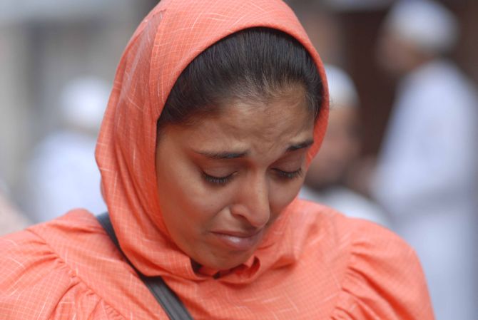 A mourner weeps at the death of Syedna Burhanuddin, in Mumbai on Saturday