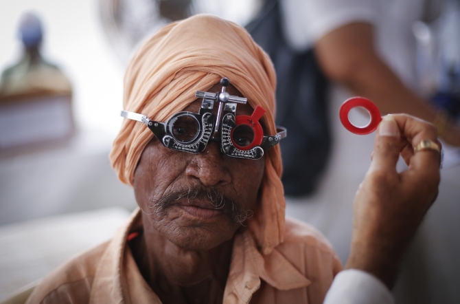 A man gets his eye tested at a free eye-care camp in Mumbai.