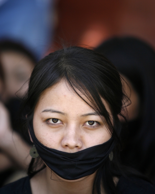 A student from northeast India attends a protest in New Delhi