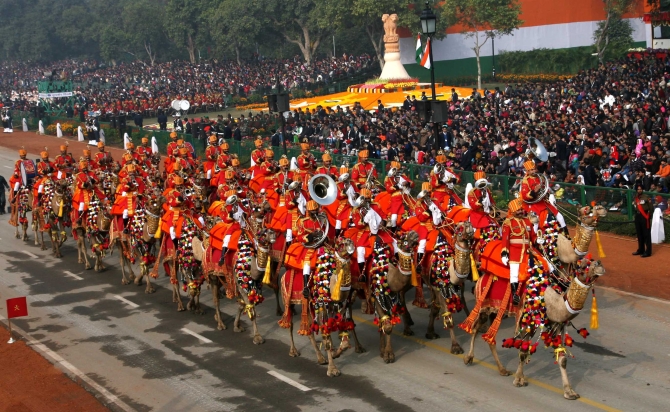 The Border Security Force camel contingent arrives during the parade