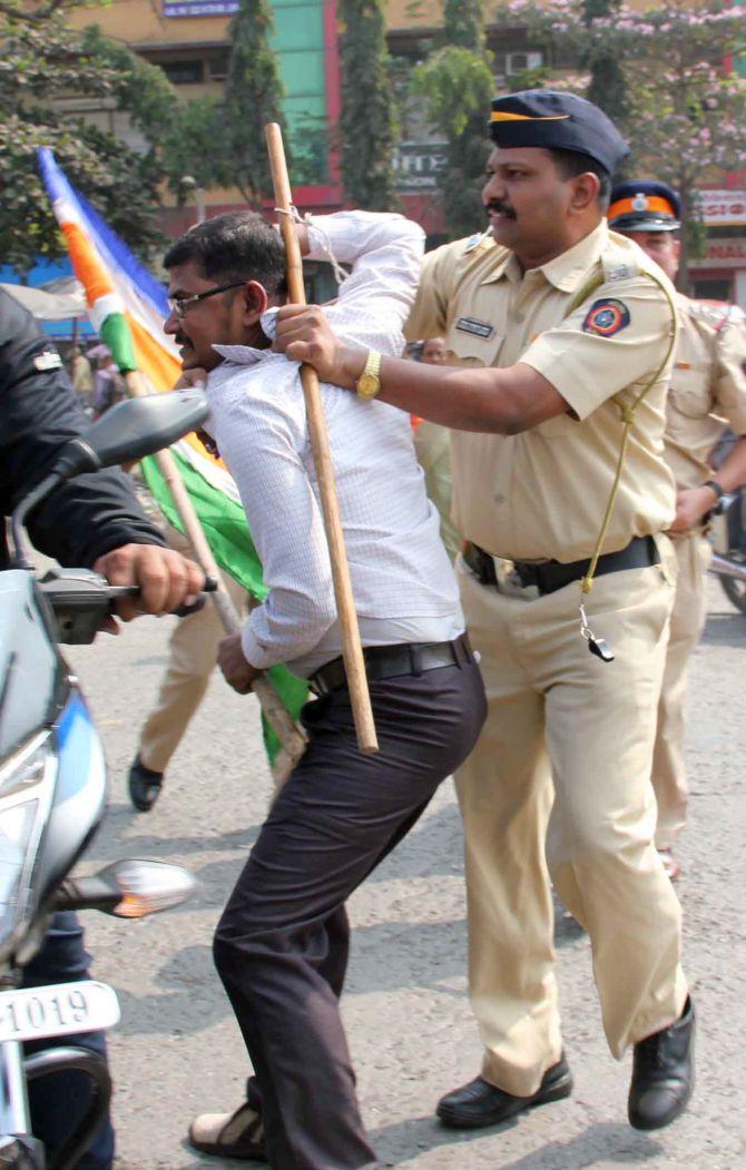 Sahil Salvi captures the image of an MNS activist picked up by the police for allege vandalism at toll booths.