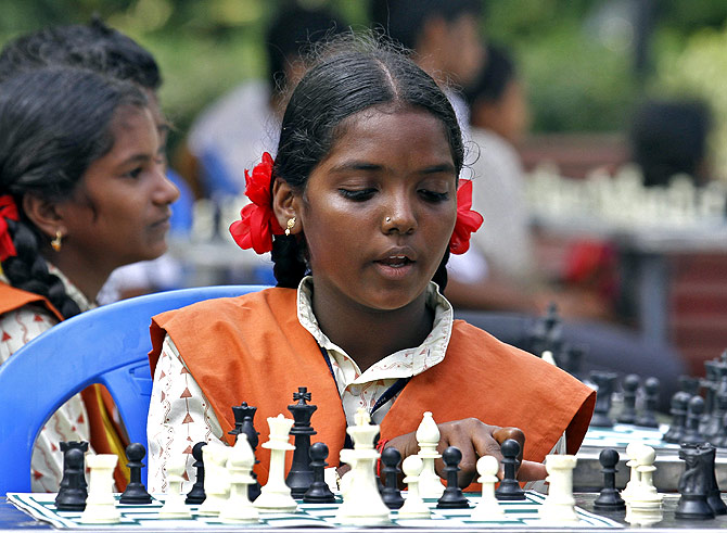 A schoolgirl plays chess in a park in Chennai. Photograph used for representational purposes only.