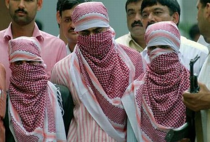 Suspected Indian Mujahideen operatives in custody.