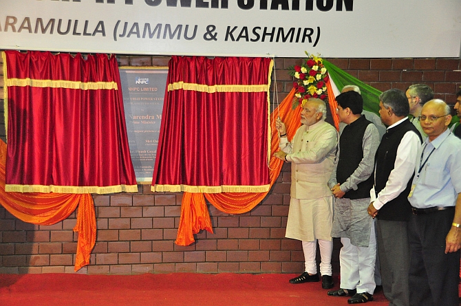Modi inaugurates the hydro electric project along with Union minister Piyush Goyal and Governor N N Vohra