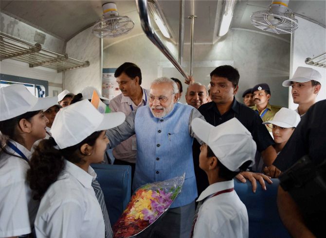 PM Narendra Modi aboard the new Katra train along with school children
