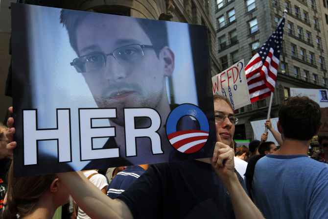 A placard hailing Edward Snowden, in Boston.