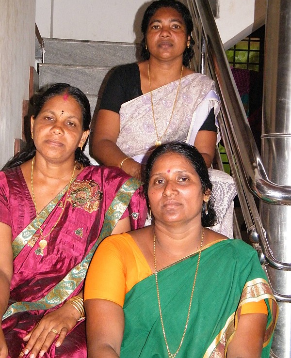 Bindu (in a green sari) with her friends Sheeba and Sreeja.
